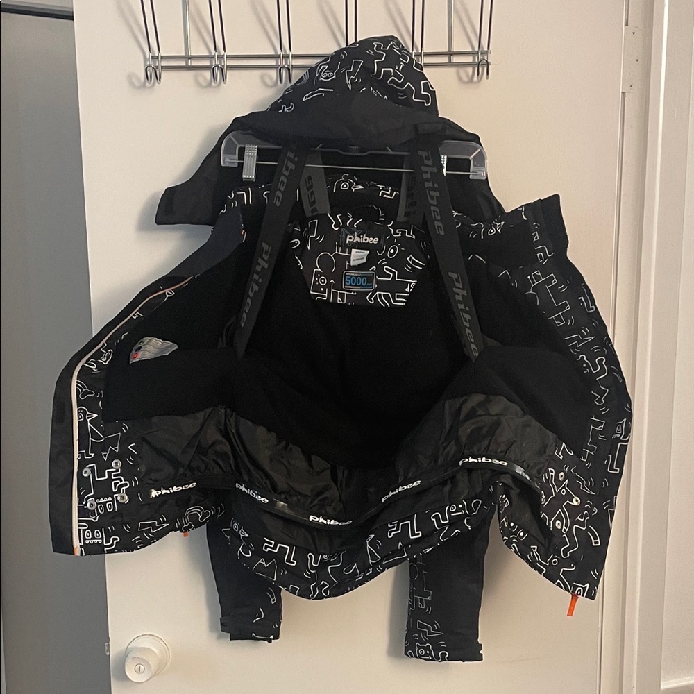 Phibee snowboarding Kids Black Jacket with orange accent